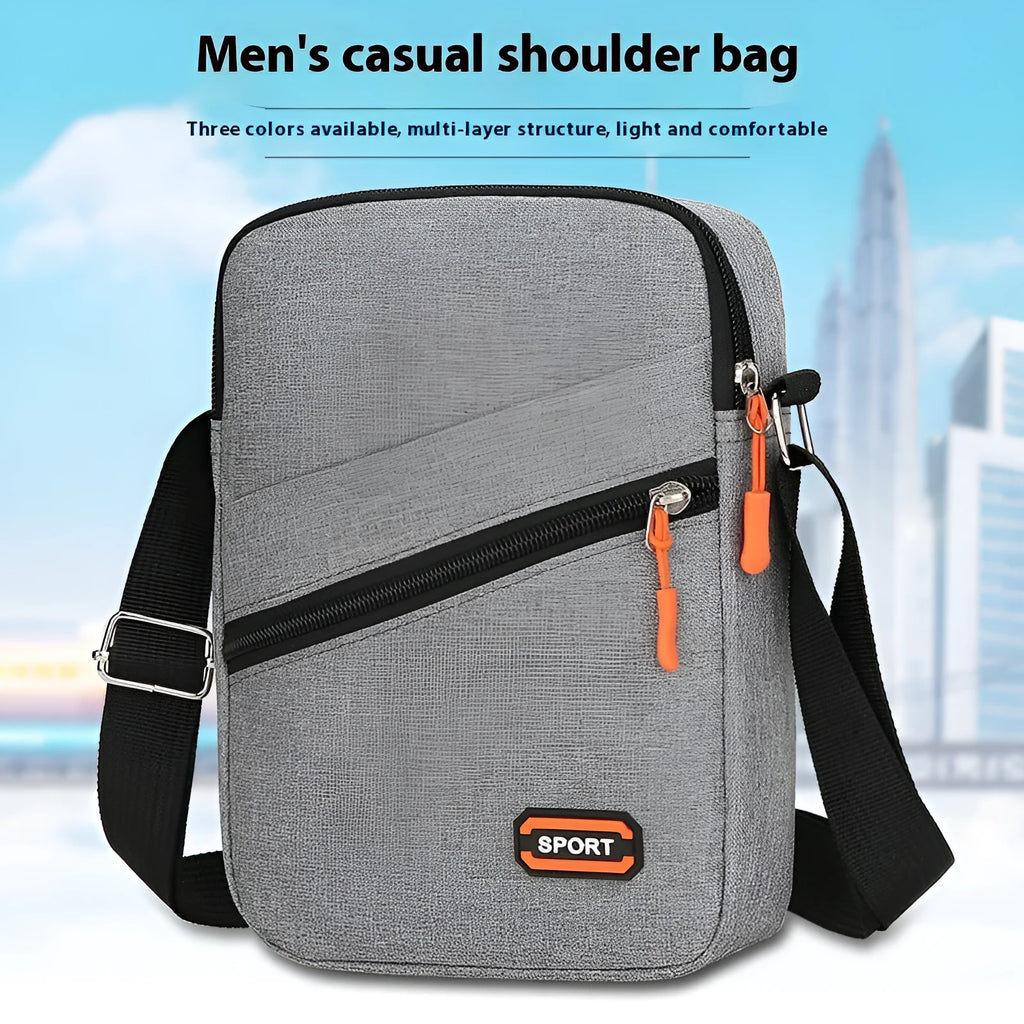 Solid colour Oxford cloth commuter bag with contrast stitching, shown with crossbody strap.