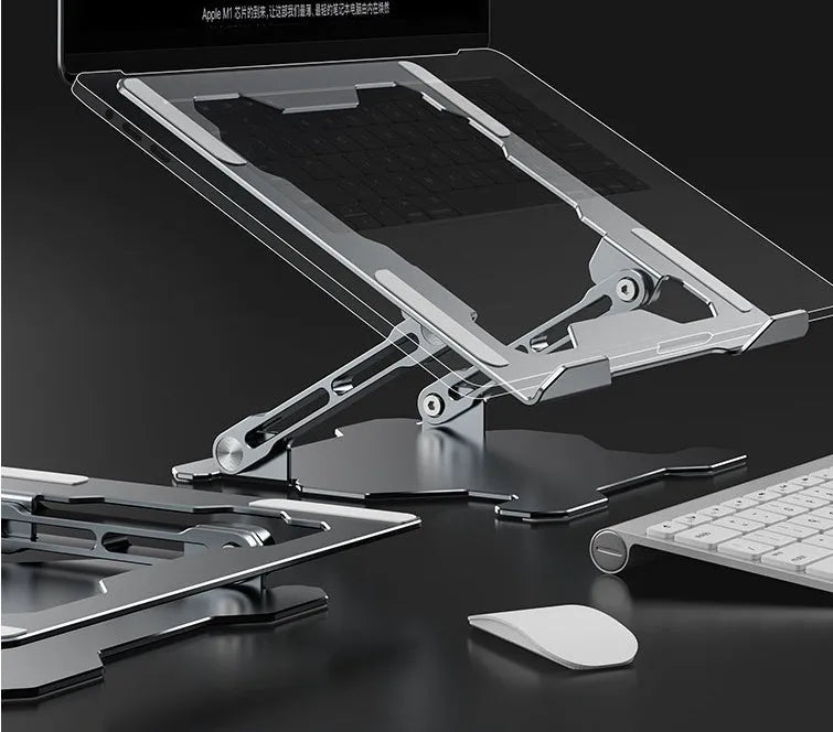 Grey adjustable aluminum laptop stand in folded and open positions on a wooden desk