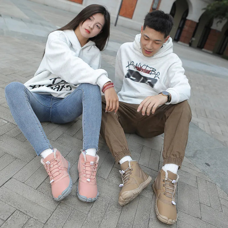 Outdoor snow boots in black, pink, or khaki with front lace-up, round toe, and low heel.