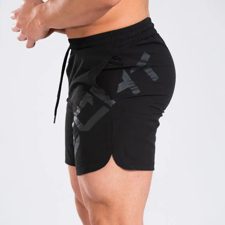 Men's black knee-length nylon training shorts with elastic waistband for summer sports