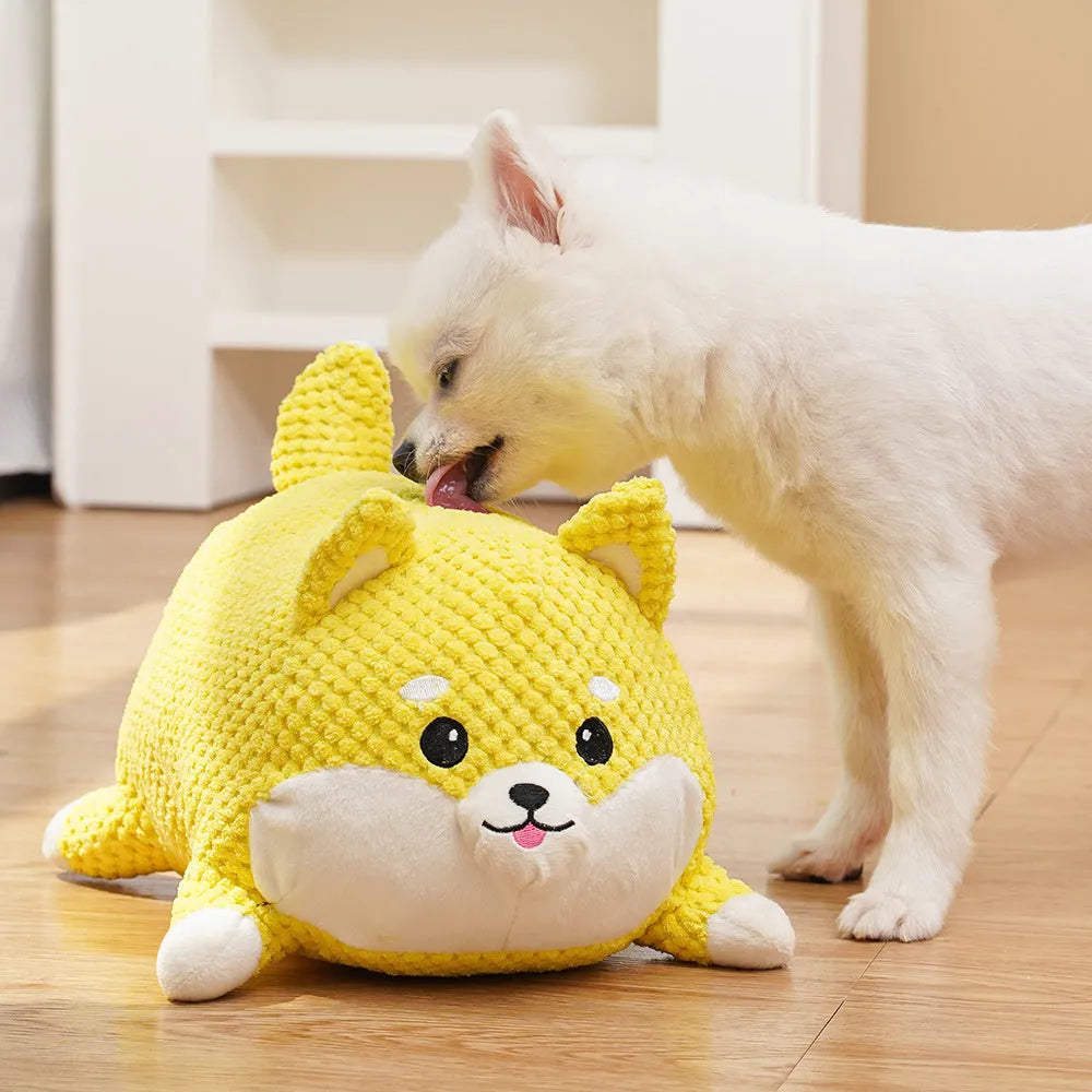 Plush calming dog toy with pillow shape, textured surface, and squeakers inside
