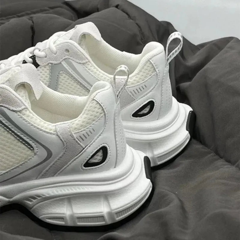 Beige mesh platform sports shoes with wedge heel, front lace-up design, and rubber sole