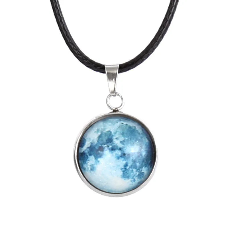 Luminous alloy necklace with a constellation-modelled glass pendant on an adjustable chain.
