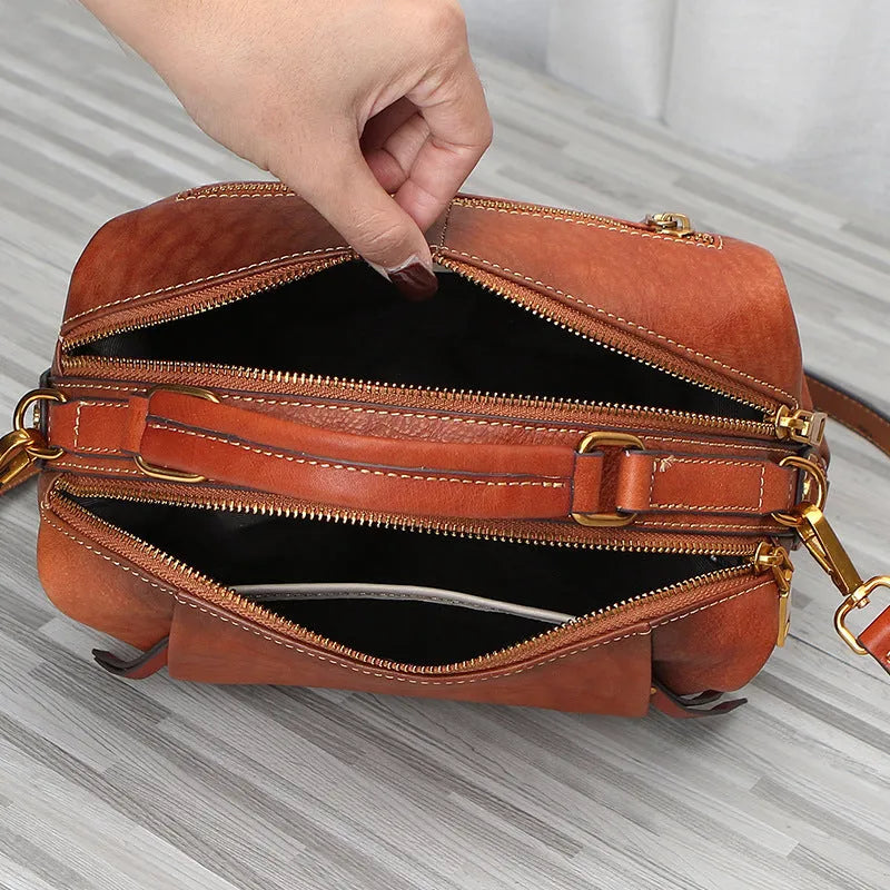 Genuine leather women's shoulder bag in brown, top grain leather, pillow shape, open outer pocket