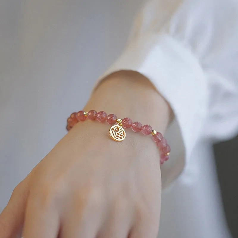 Strawberry quartz blessing card bracelet with clear glass and red gemstones