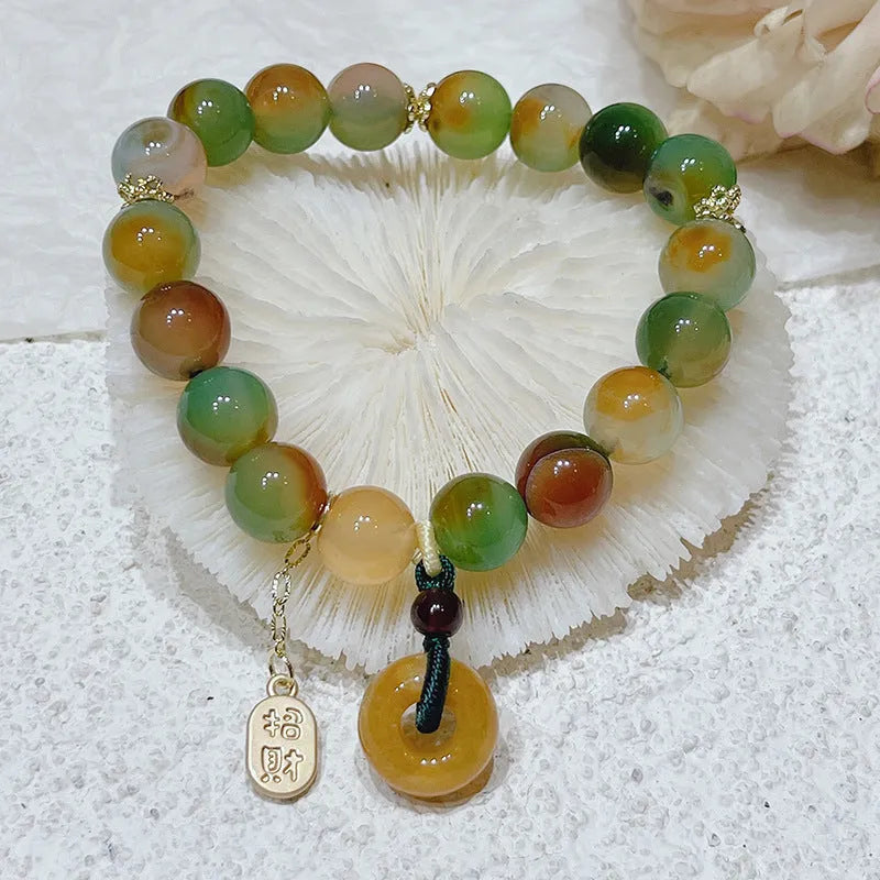 Yellow peacock agate bracelet with peace buckle clasp and old mine topaz stones