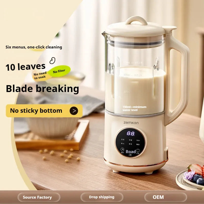 Automatic soya milk maker with glass jug in milky white colour on a kitchen countertop.