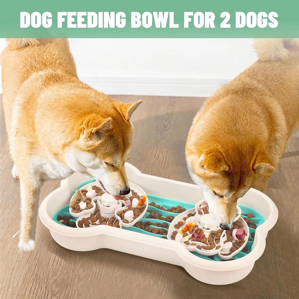 Large green slow feeder dog bowl with three-tiered puzzle trays and anti-slip suction cups on the base.