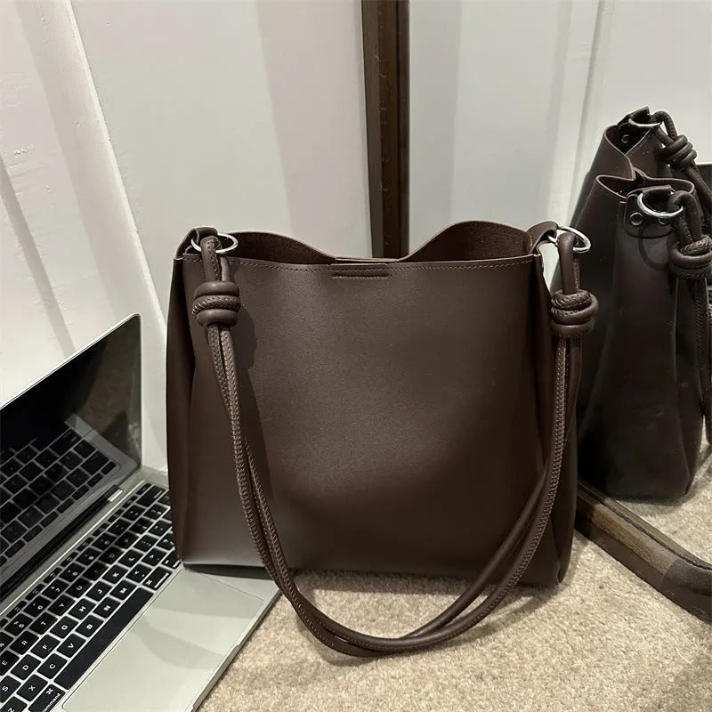 Women's crossbody tote bag in retro bucket shape, PU material, available in yellow brown, brown, black, khaki, with sewing line detail