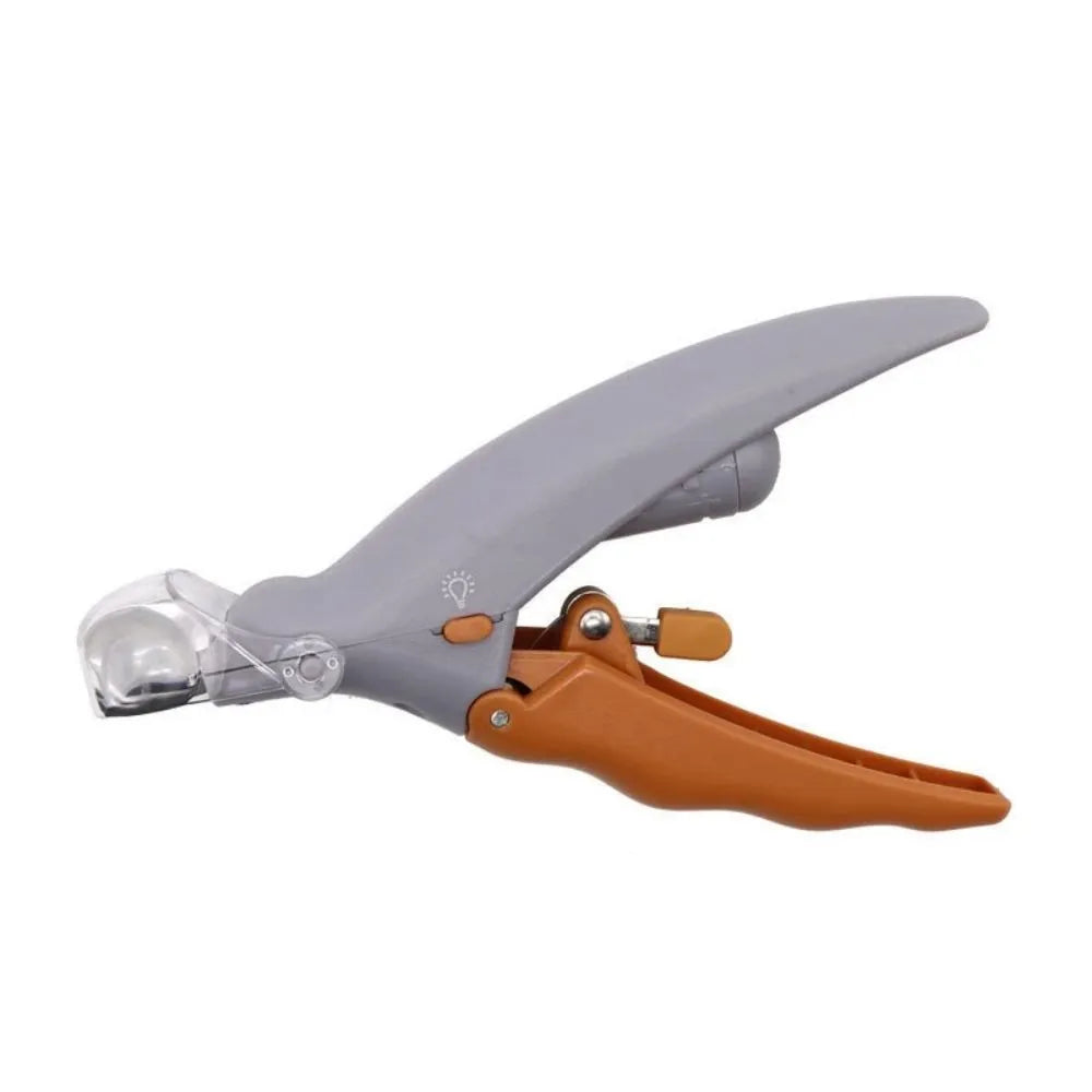 Yellow pet nail clipper with built-in LED light and magnifying lens for trimming dog and cat nails.