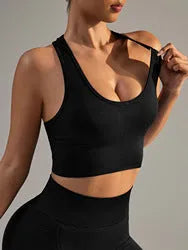 Black cross-back sports bra with quick-dry nylon fabric for running and yoga support