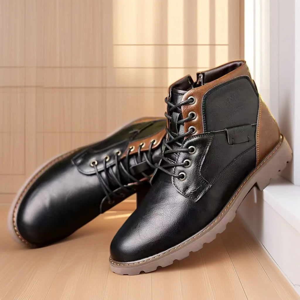 Men's brown leather-look ankle boots with a side zip fastening and rubber sole on a white background.