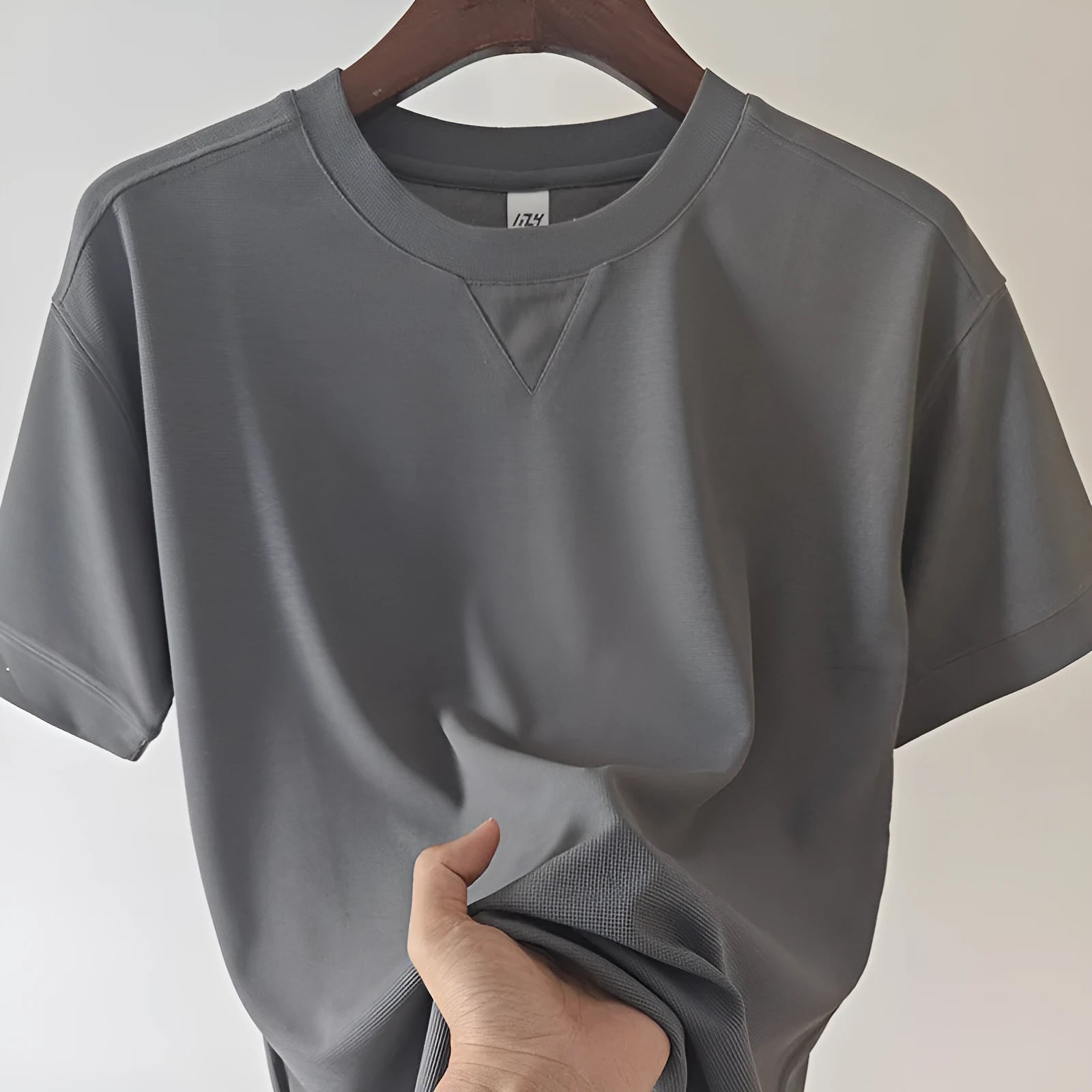 Men's waffle-textured heavy short-sleeved T-shirt in a solid colour, showing detail of fabric texture.