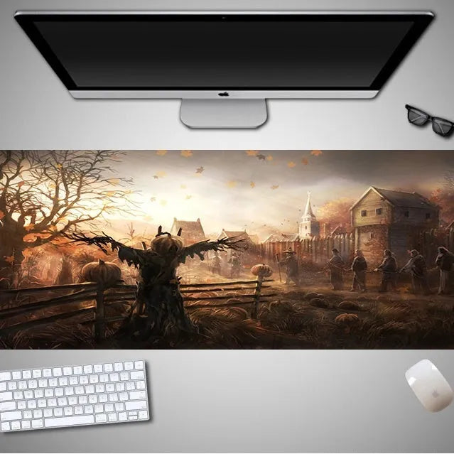 Oversized Halloween-themed gaming mouse pad with non-slip rubber base on a desktop