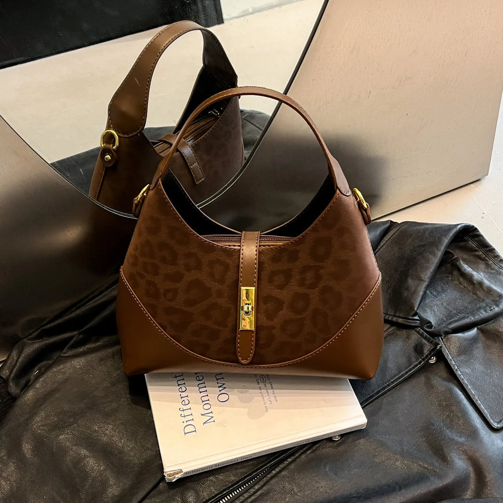 Nylon shoulder messenger bag in red, brown, coffee, or black with single strap and zip changing bag