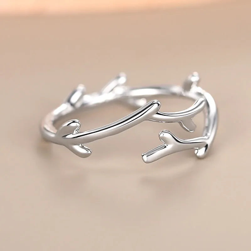 Minimalist Branches classic adjustable ring in white gold colour with leaf and geometry design on copper base