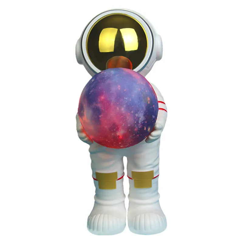 Spaceman starry sky projection lamp with astronaut holding moon design in fantasy painted finish