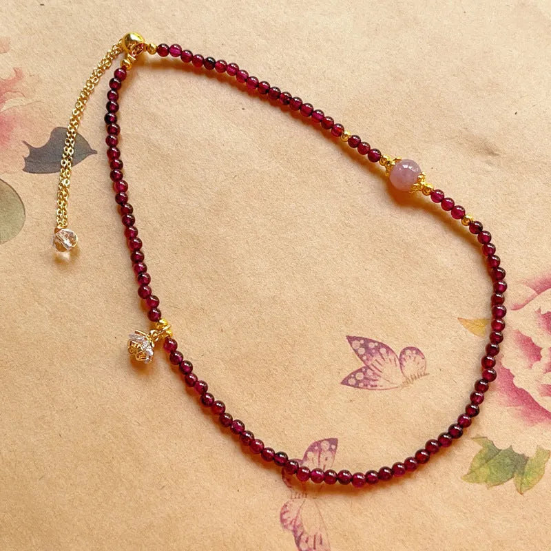 Natural garnet women's bracelet with double ring design and genuine stones