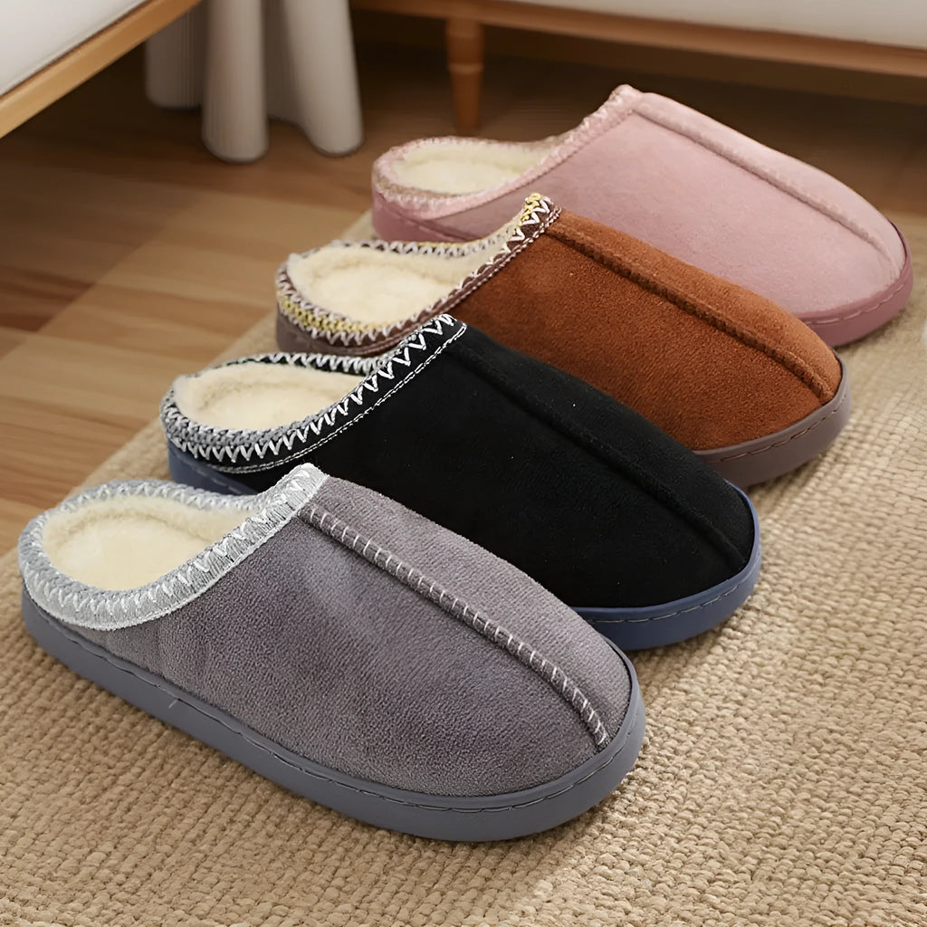 Pair of winter indoor slippers with thick 3cm PVC sole and warm artificial velboa lining, shown in black, coffee, gray and pink.