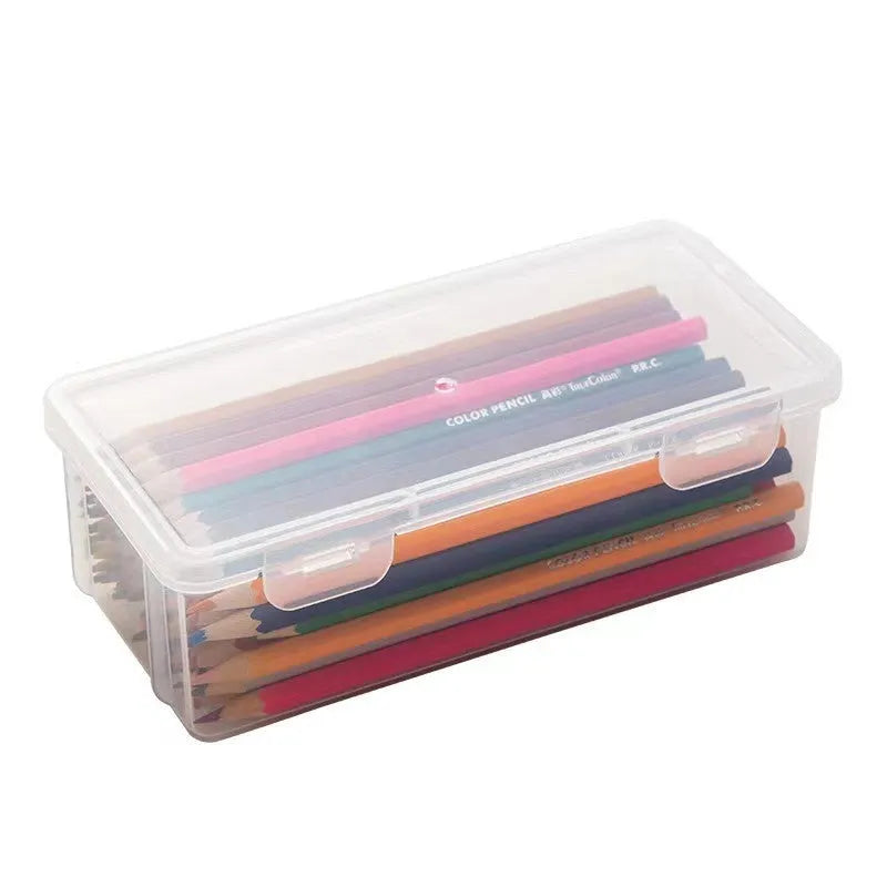 Large transparent plastic stationery storage box holding coloured pencils and crayons.