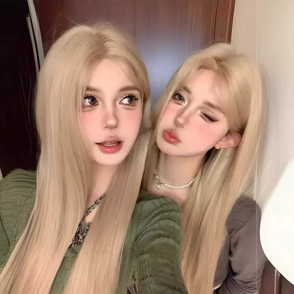 Long straight milk tea blonde synthetic wig on a stand with hair net