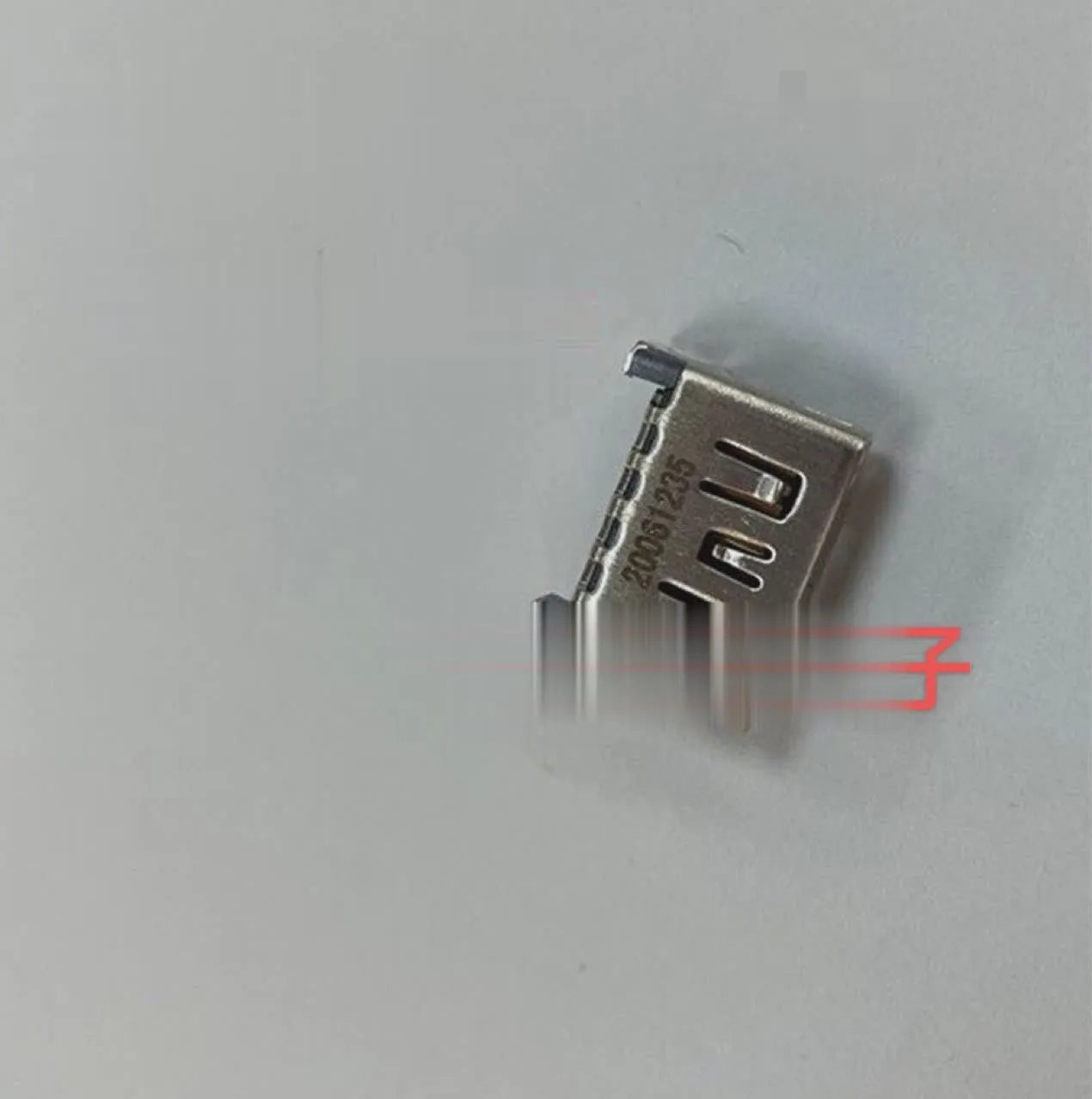 Silver metal HDMI host interface socket connector with mounting holes.