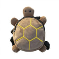 Turtle-shaped dog backpack harness in green colour with metal zipper