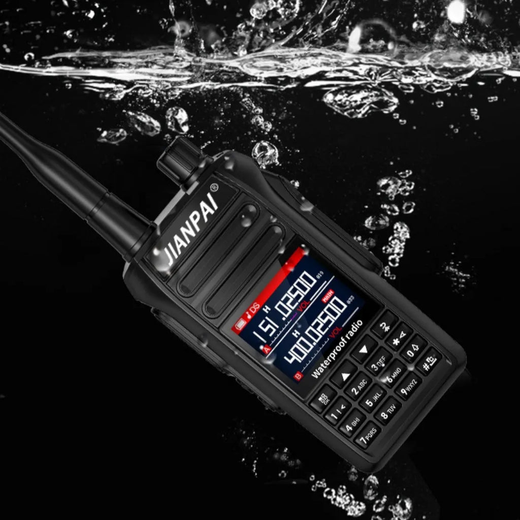 Black Interphone waterproof aviation full band radio headset with plastic shell and included accessories on a table.
