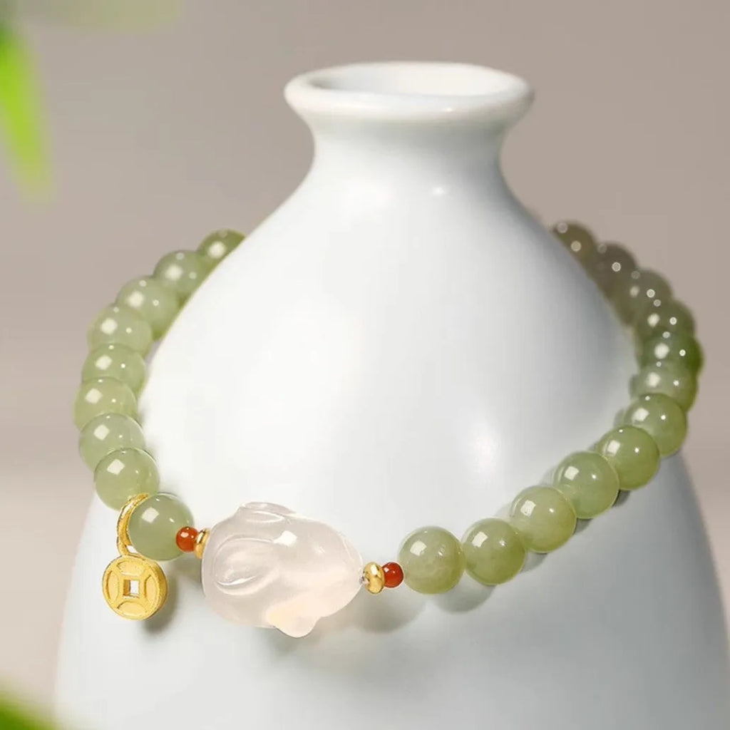 Hetian jade rabbit bracelet for women with animal zodiac design and glass construction