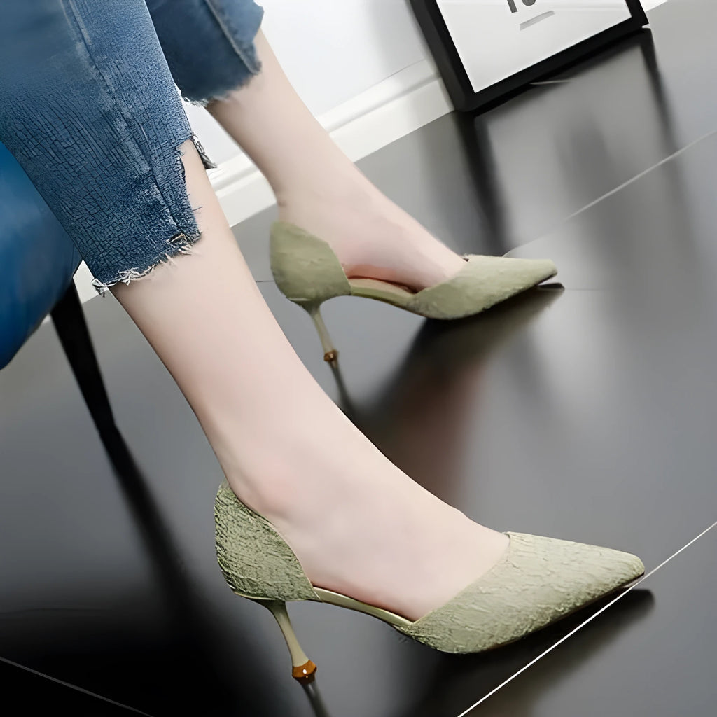 Women's black pointed toe stiletto high heels with a 6-8cm heel on a rubber sole.