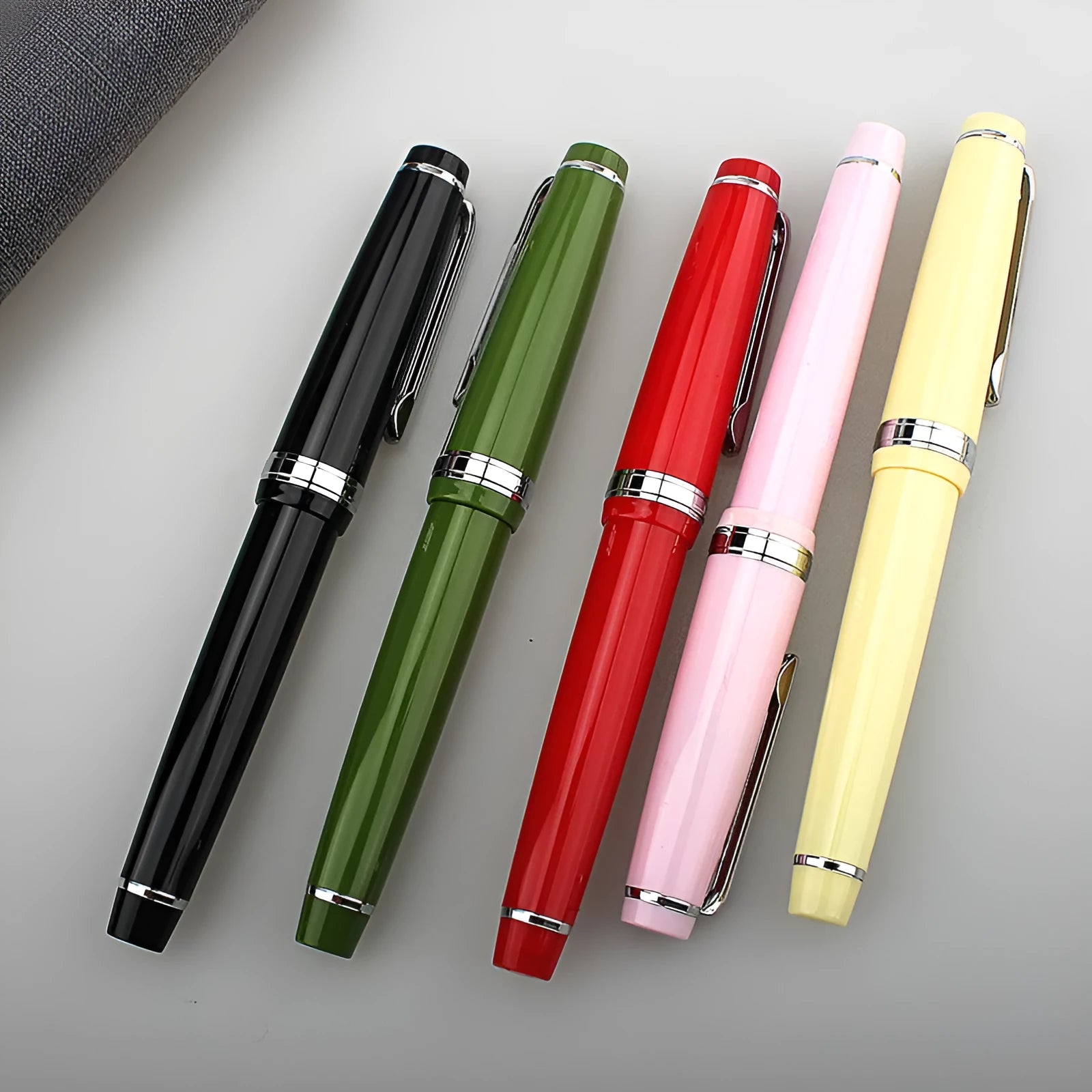 Short pocket business pen with resin shell and stainless steel nib in multiple colour options