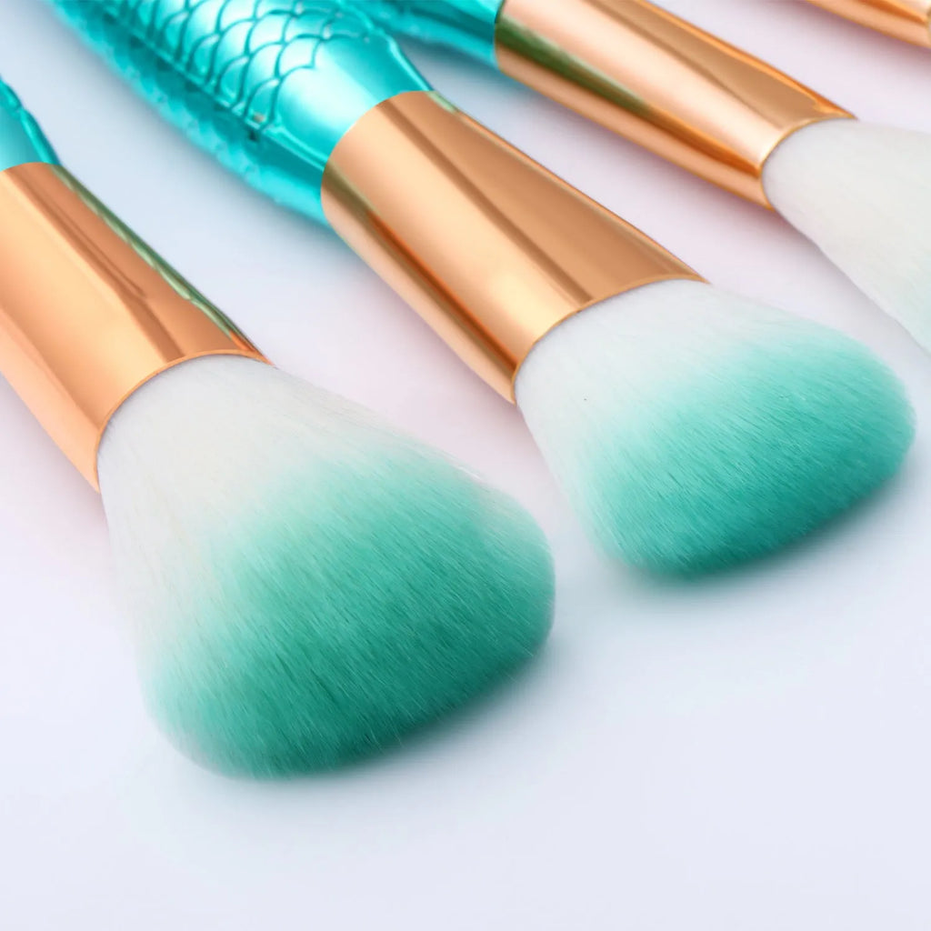 11-piece mermaid makeup brush kit with synthetic bristles, angled and tapered shapes