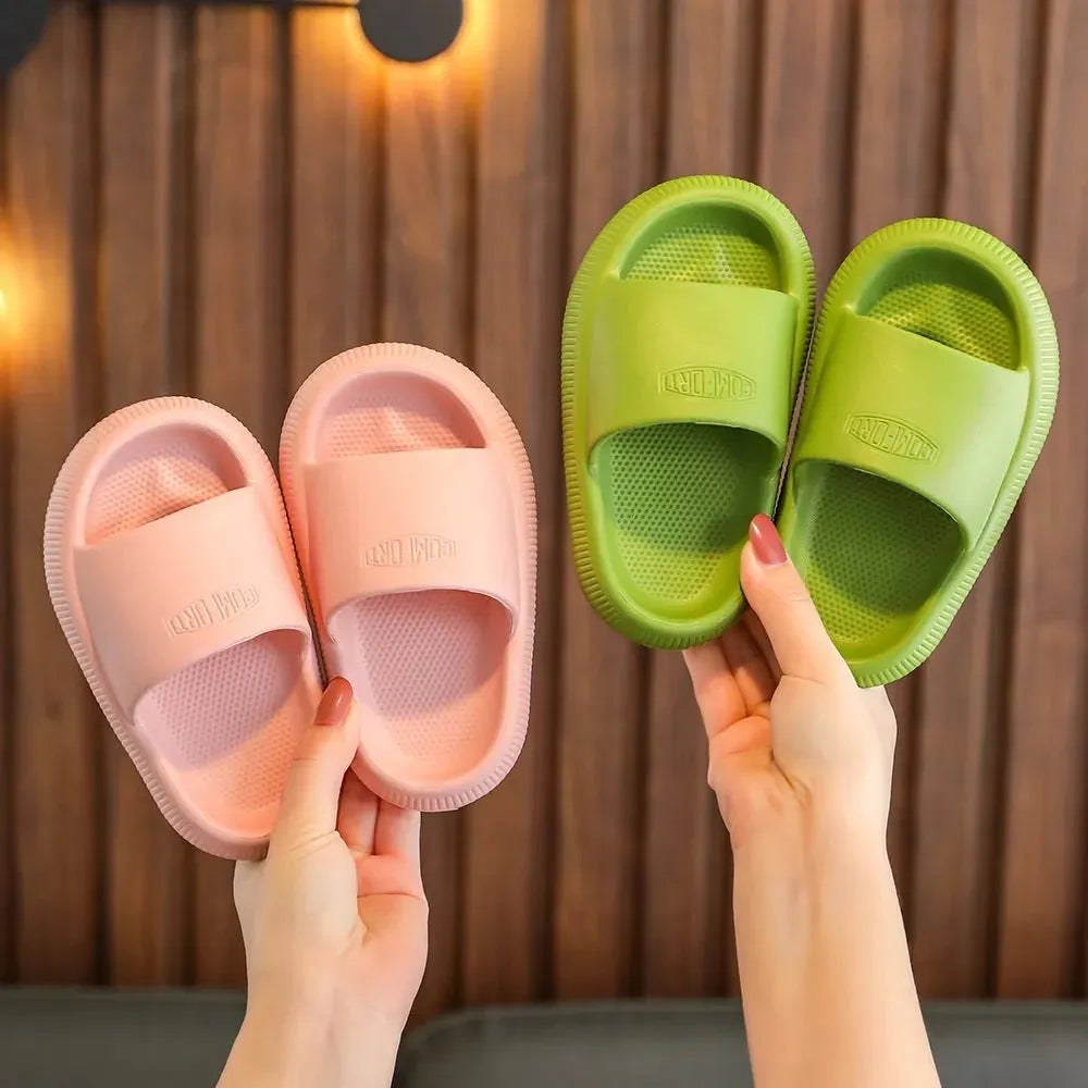 Children's mixed colour EVA slippers with a thick non-slip sole, shown in sizes for kids.
