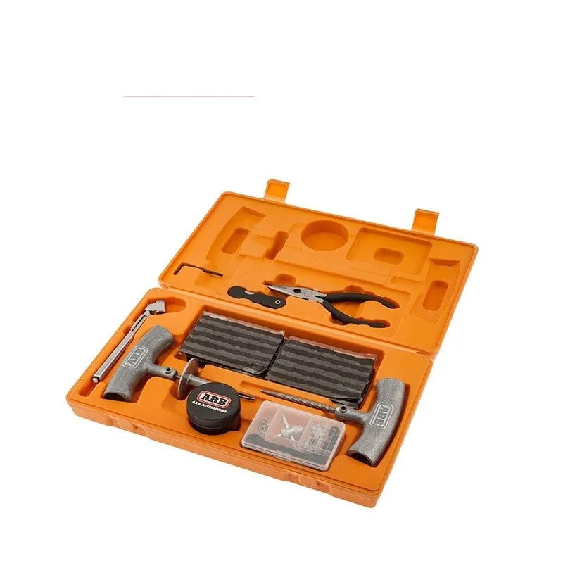 Emergency tyre repair tool set with spring steel insertion tool, reamer tool and pressure gauge in compact case