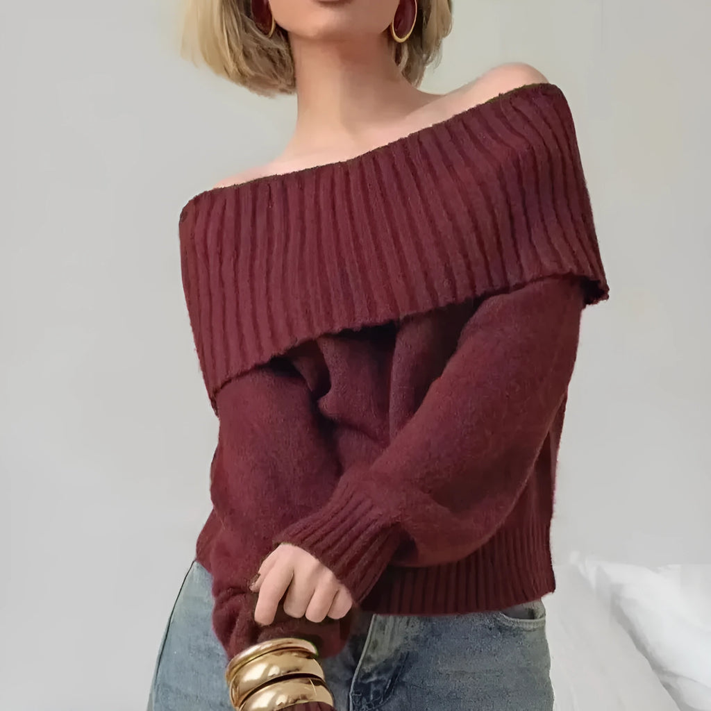 Grey strapless off-the-shoulder sweater with a 3D pattern on a mannequin.