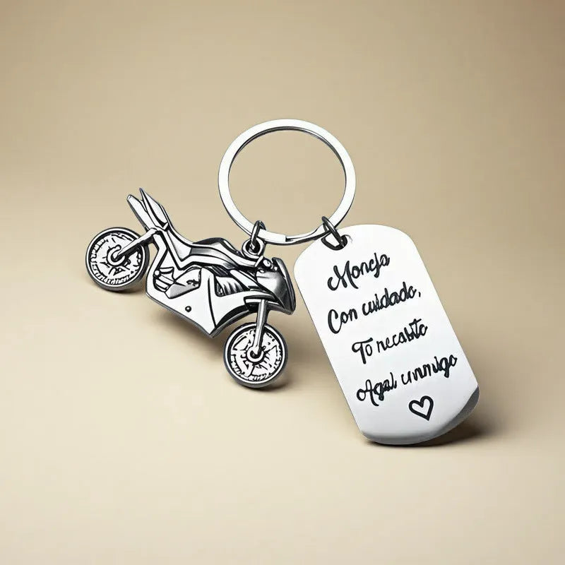 Stainless steel motorcycle keychain with velvet cloth on flannel background