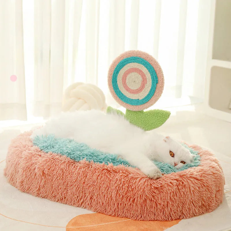 Pink elliptical plush cat nest bed with a soft padded base, shown disassembled.