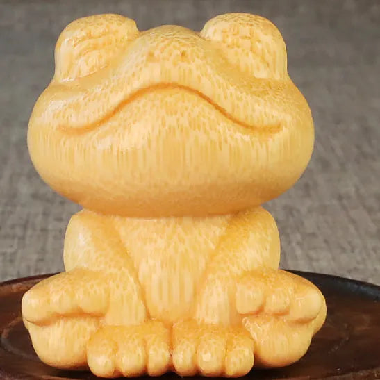 Smiling frog solid bamboo carving ornament with cartoon style measuring 5cm tall