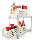 White plastic two-tier desktop storage rack 41.5x19.3x9.3cm on countertop with toiletries