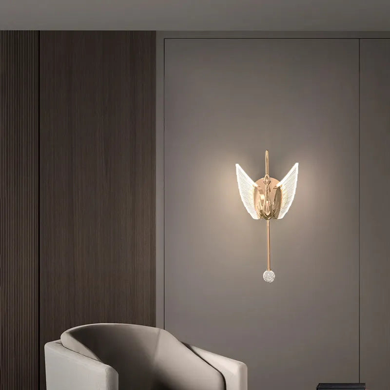Gold modern swan-shaped bedside wall lamp with acrylic shade and dimmable LED lighting.