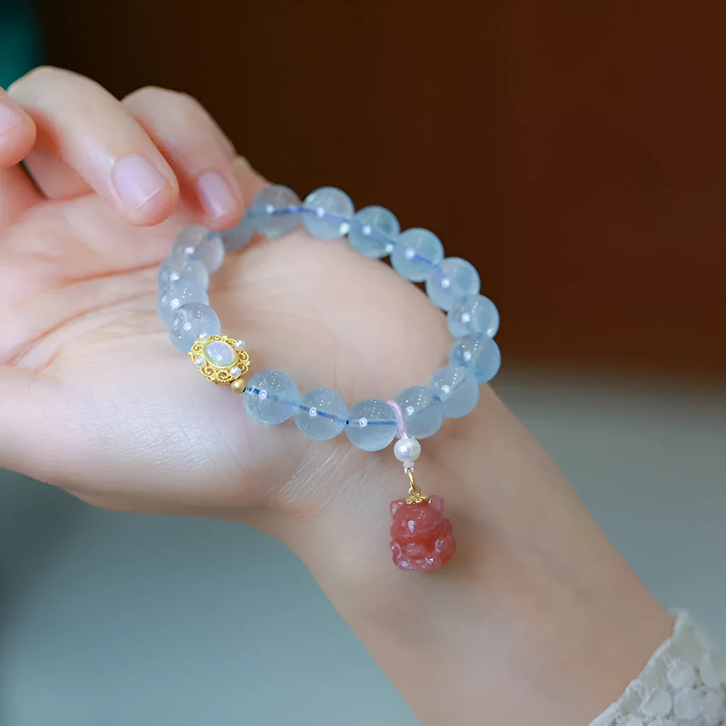 Aquamarine Chinese Fengjiu style bracelet with fox design and pink crystal accents for women