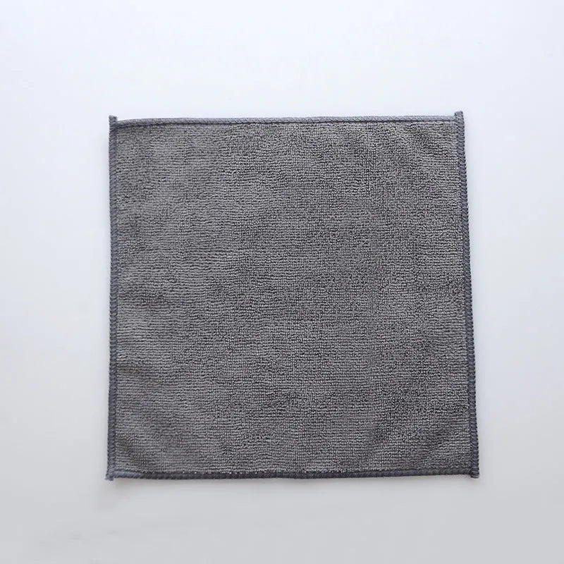 Grey square microfiber kitchen cleaning cloth for oilproof, lint-free drying of pots and bowls.