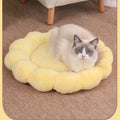 Blue half-surrounded petal-shaped pet bed for dogs and cats on a wooden floor