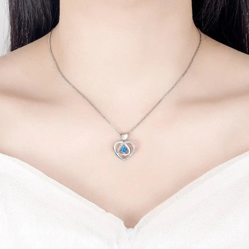 Blue beating heart necklace and bracelet set with mixed gem inlay on electroplated copper