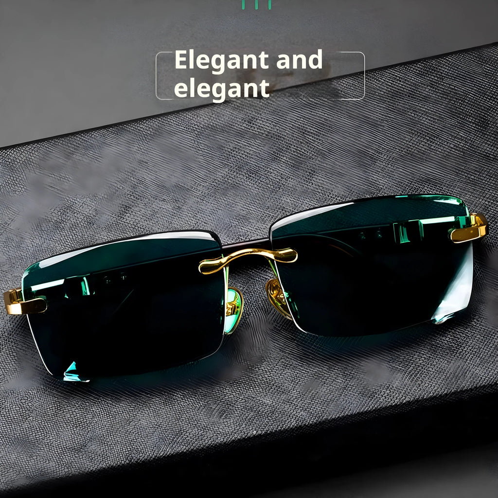 Frameless dark green crystal sunglasses with a glasses case and cleaning cloth.
