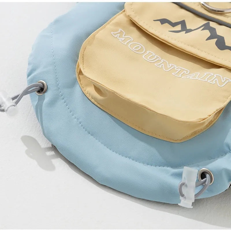 Dog windbreaker in sunny yellow-blue colour block, windproof two-legged cotton coat with tall collar and D-ring on a small dog