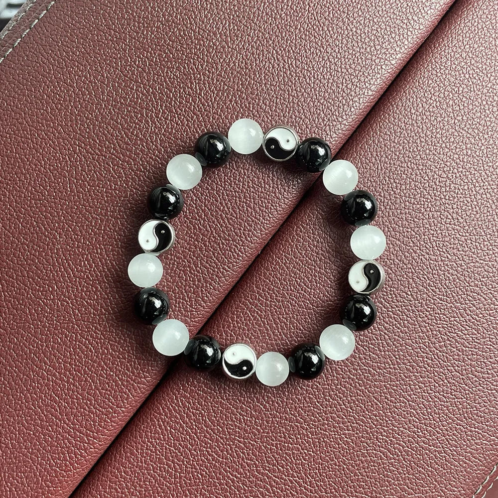 Natural opal agate Chinese Tai Chi beaded bracelet with 10mm polished stone beads and black agate details