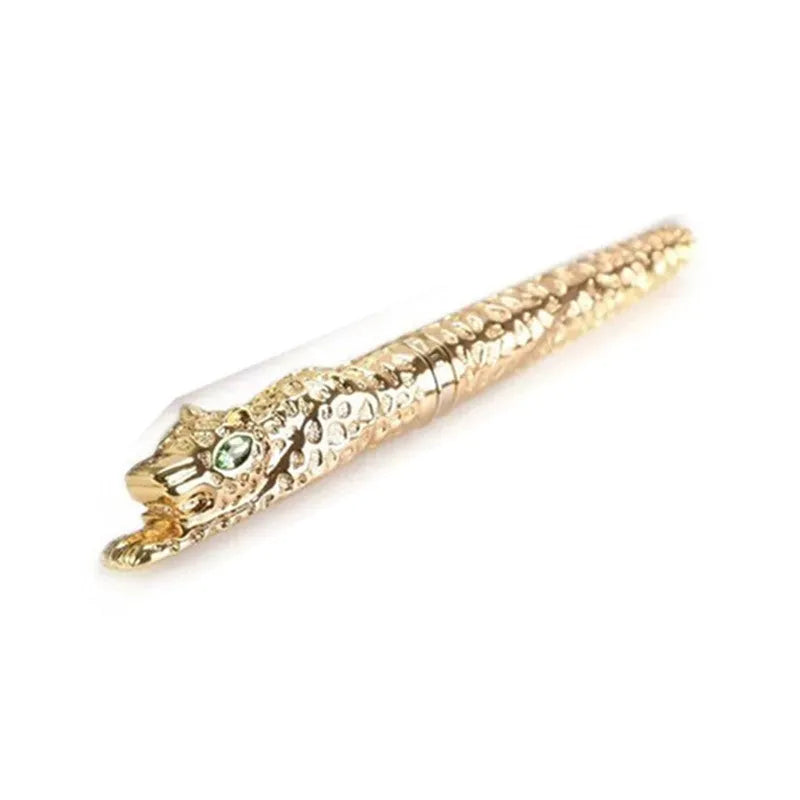 Embossed metal business pen in ancient silver or gold colour on a plain background.