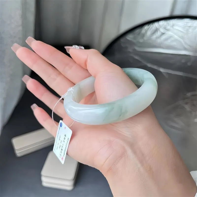 Tian Shan Cui ice-like floating flowers bracelet with animal zodiac modelling on wrist