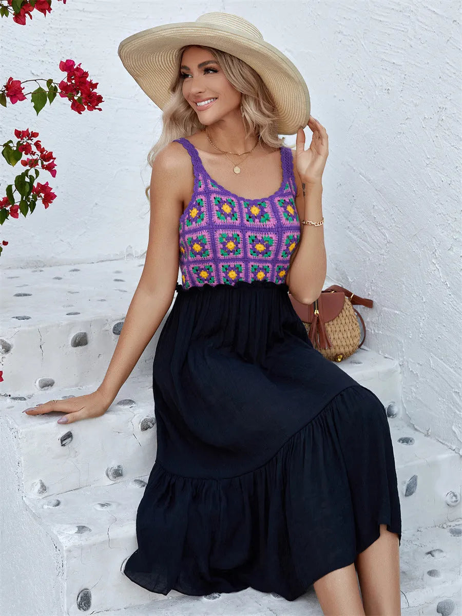 Purple sleeveless dress with raised hand-hooked floral embroidery on the fabric.